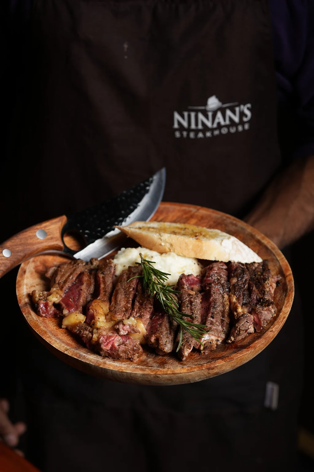 Ninan's Kinky Ribeye sliced and plated tableside